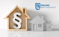 Symbolbild Rechtsschutz: kleine Häuser mit Paragraph und ROLAND-Logo